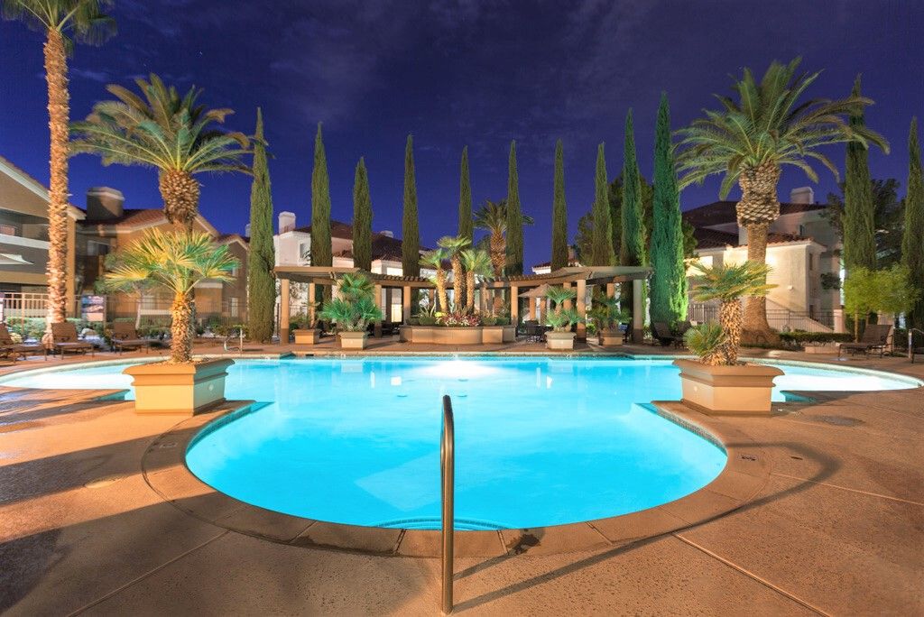 Community pool and exterior grounds at Silverado Apartments in Tucson, Arizona